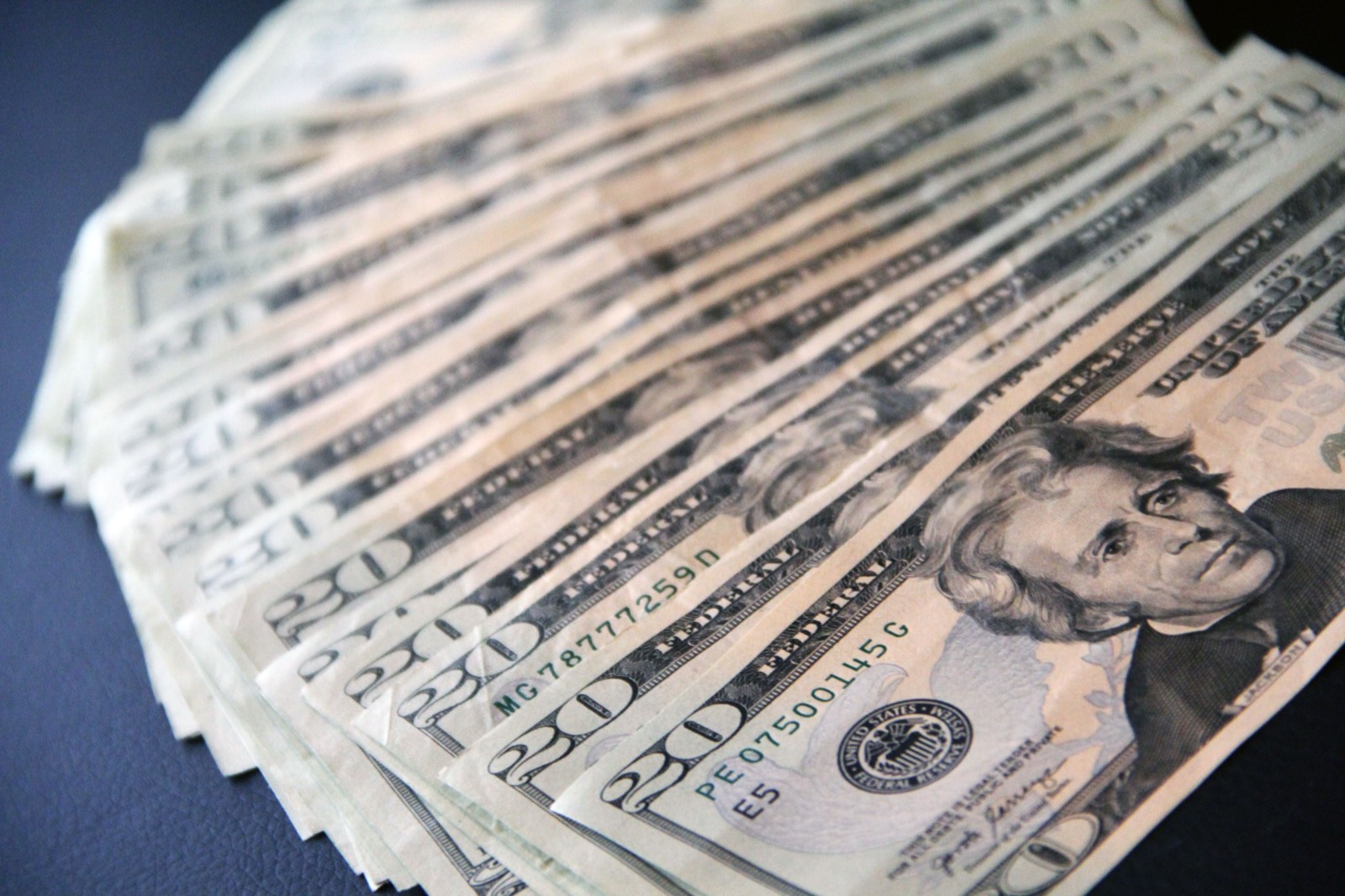 A fanned stack of U.S. hundred-dollar bills